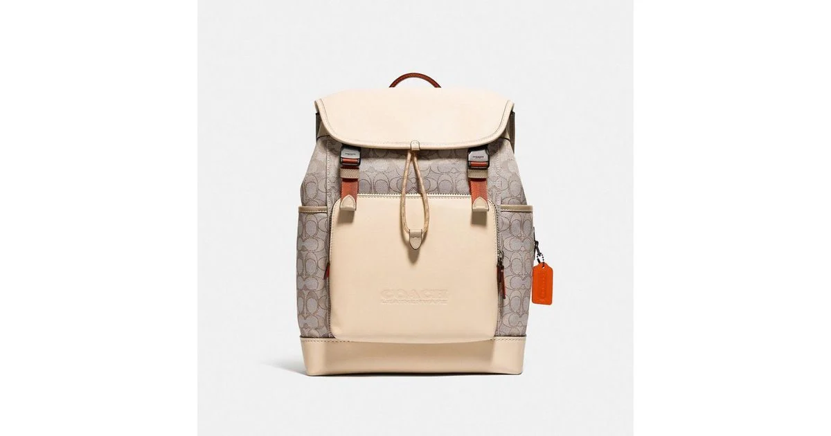 COACH Leather League Flap Backpack In Signature Jacquard in Black Copper/Stone/Ivory
