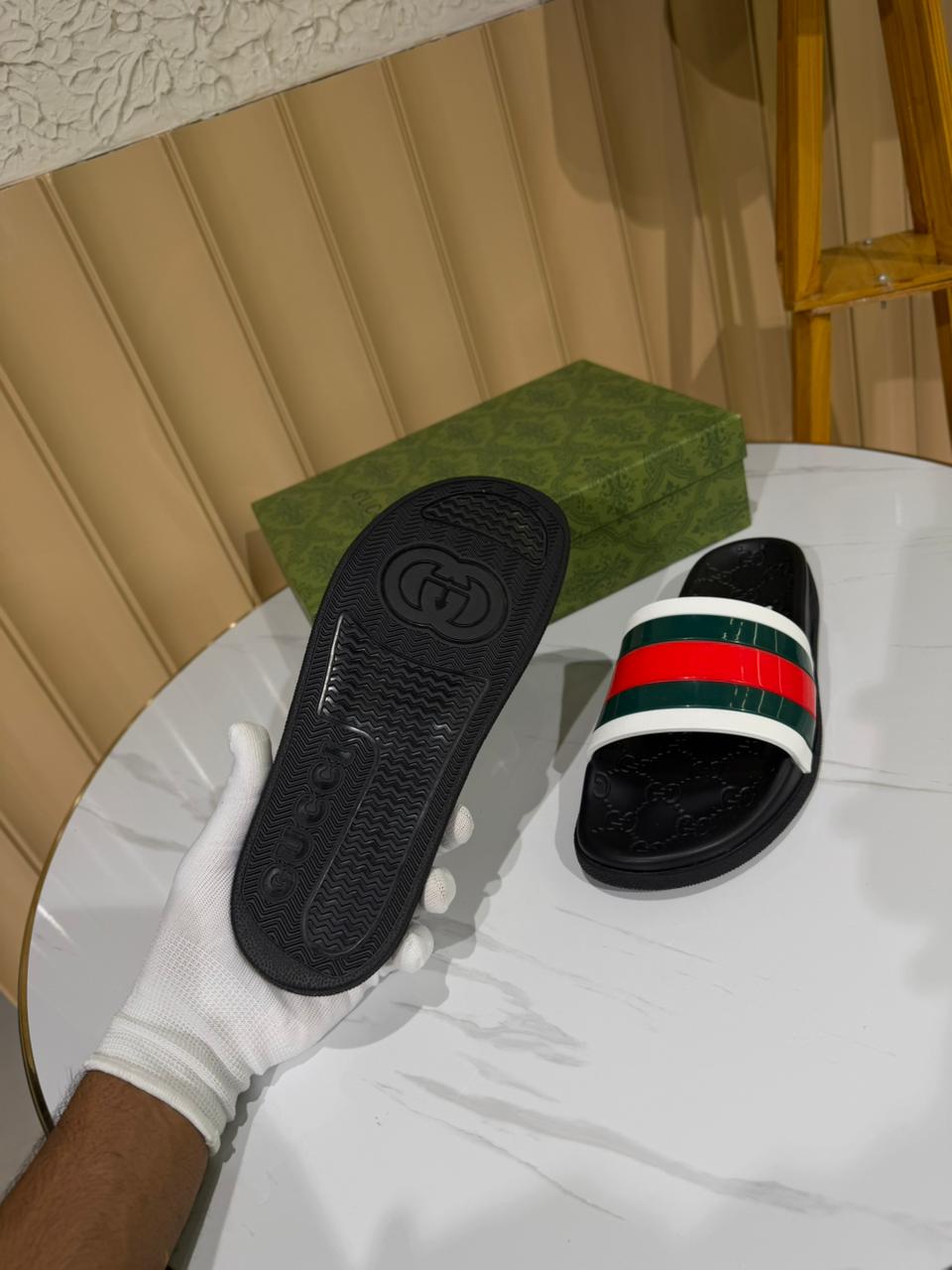 Gucci black rubber slide sandals featuring red and green bands - Image 4
